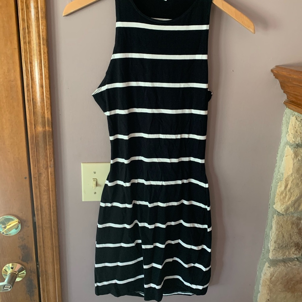 Form fitting with open back, white and black dress